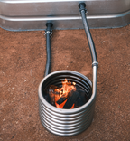 Stainless steel wood fire coil kit connected to the hot tub
